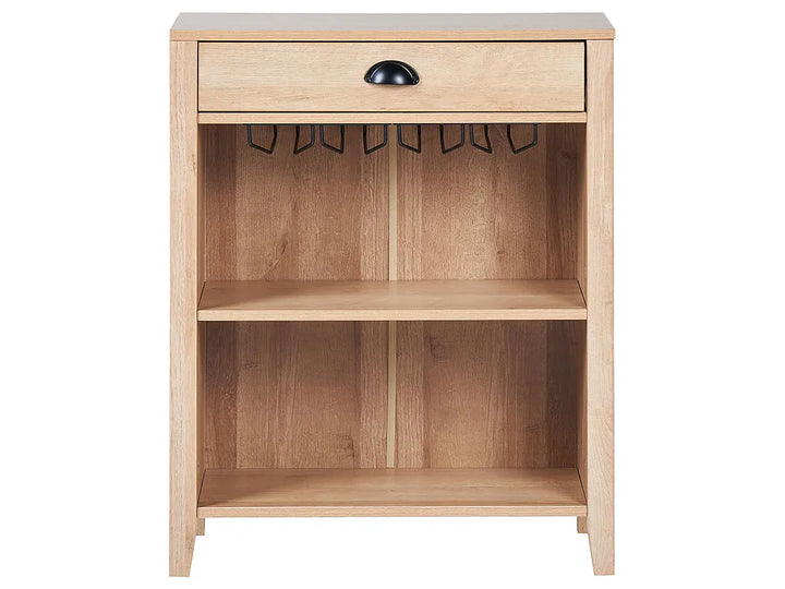 A light oak wood side cabinet with a single drawer featuring a black metal pull handle, two open shelves, and black wire coat hangers hanging from the top of the drawer front, shown against a plain white background.