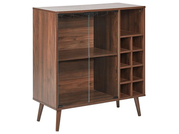 A mid-century modern wooden cabinet with a warm brown finish, featuring glass sliding doors on the left and open shelving and wine bottle storage on the right, supported by tapered legs.
