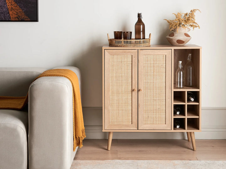 Wooden cabinet with shelves and decorative items in a living room setting