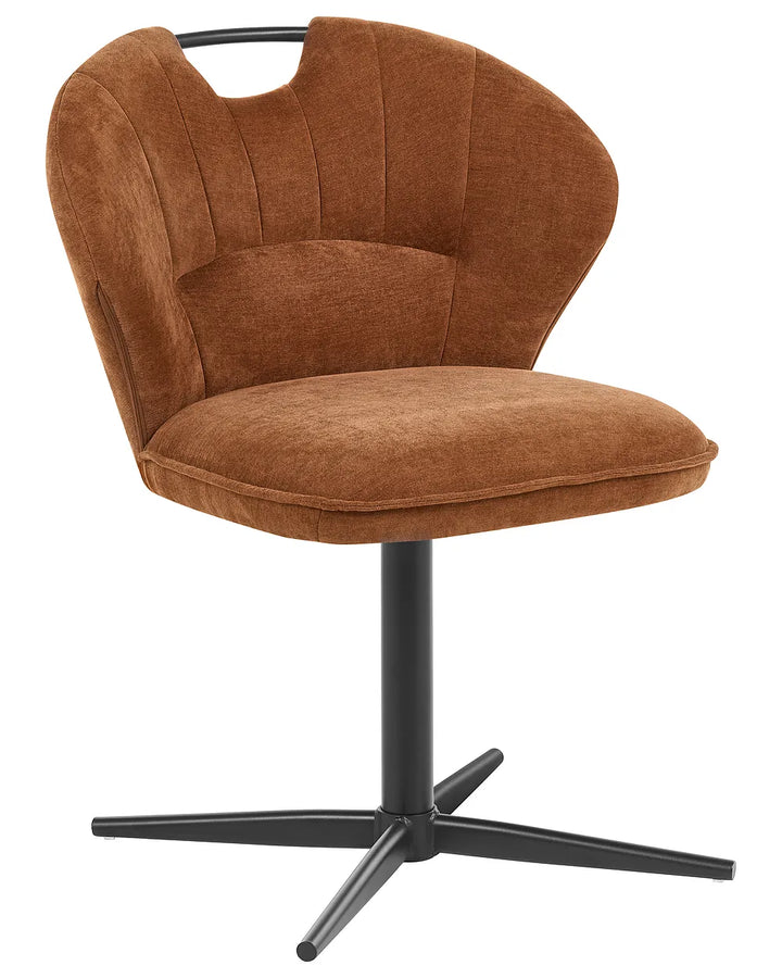 A modern swivel dining chair upholstered in a warm brown velvet fabric, featuring a curved backrest with a cutout at the top, a padded seat, and a black metal four-star base.