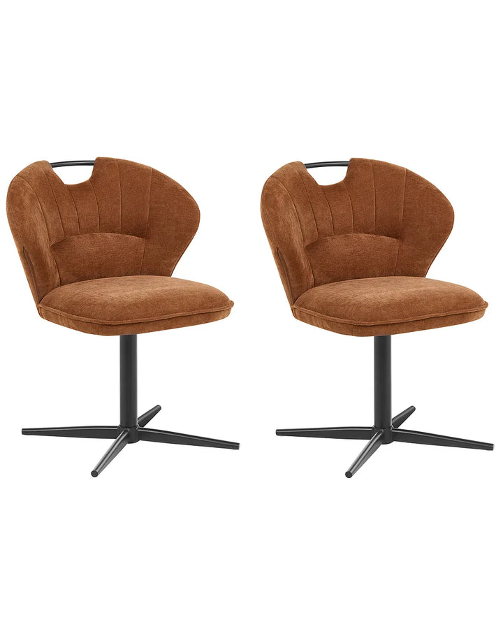 Two matching swivel dining chairs upholstered in a warm brown velvet-like fabric, featuring curved backs with integrated black metal headrest bars and black starburst pedestal bases, shown against a plain white background.