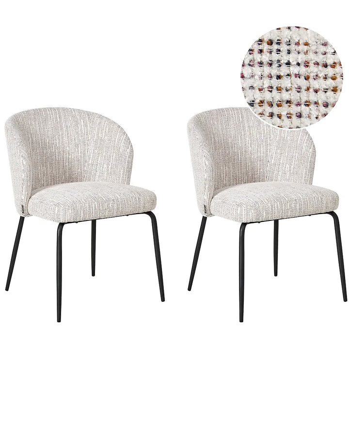 Two upholstered dining chairs with curved backs, light beige textured fabric seats and backs, and slim black metal legs, shown on a white background with a circular fabric detail inset.