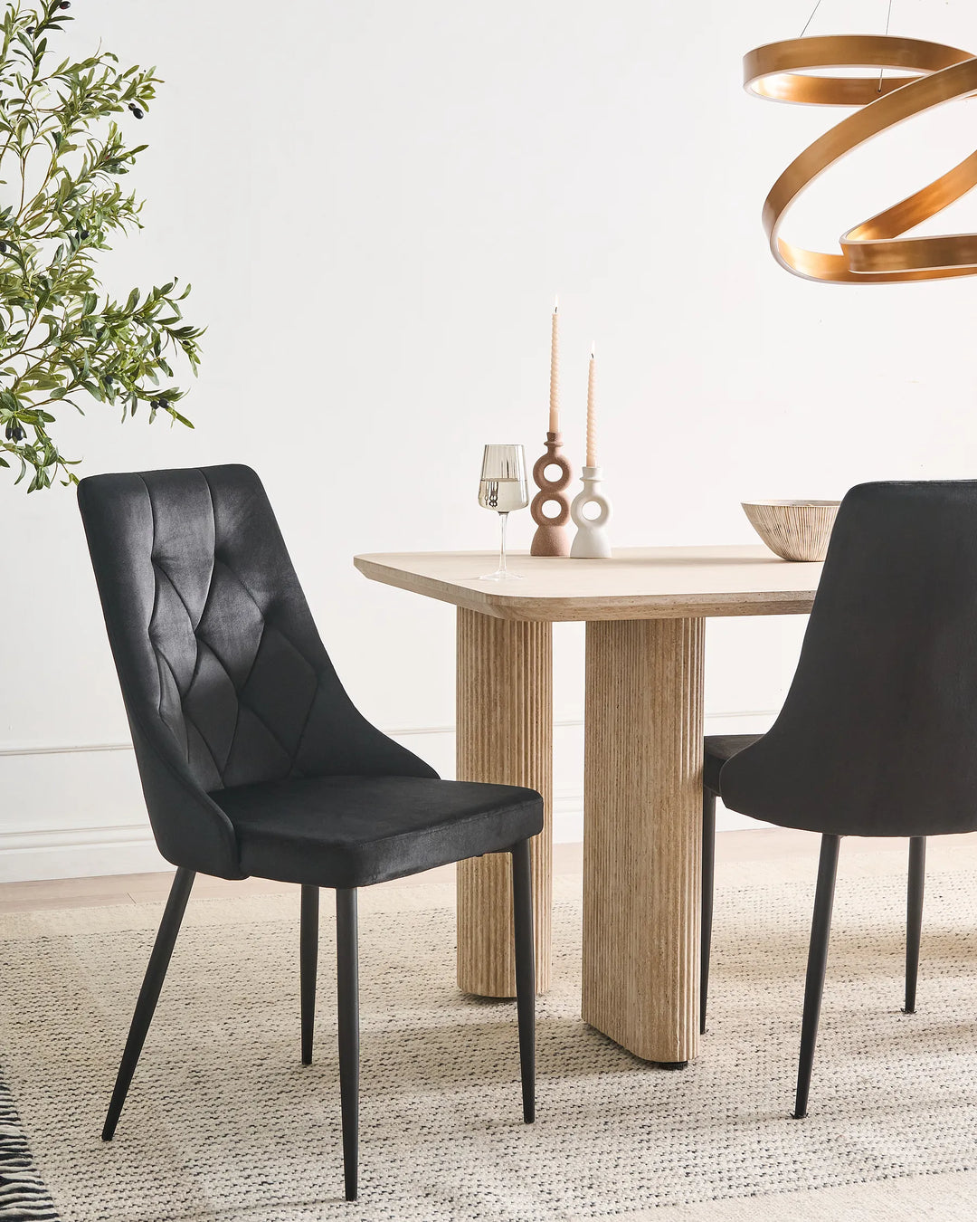 Black velvet dining chairs with upholstered seats