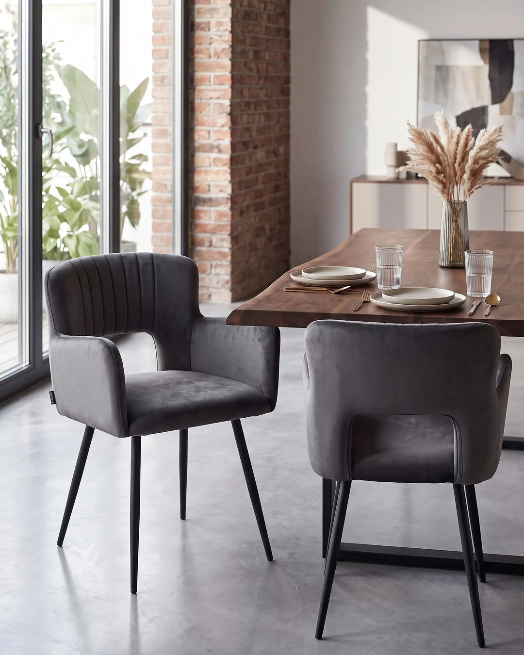 Dark grey velvet dining chairs with upholstered seats