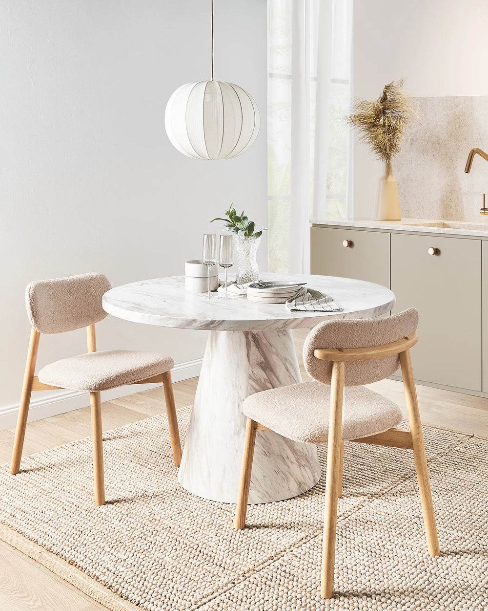 Light brown wooden dining chairs with beige seats