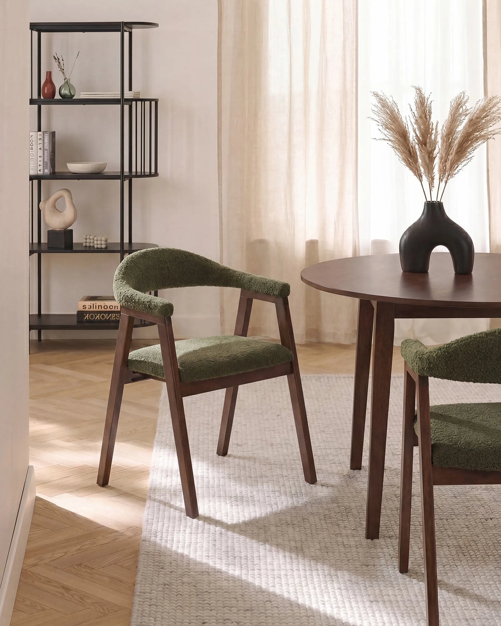 Brown dining chairs with green upholstered seats