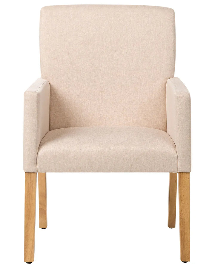 Beige armchair with wooden legs on a white background