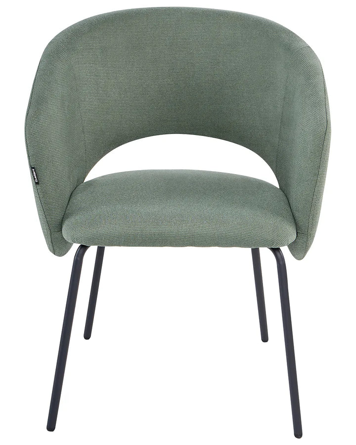 A modern upholstered dining chair with a curved backrest and seat in sage green fabric, supported by slim black metal legs, shown against a plain white background.