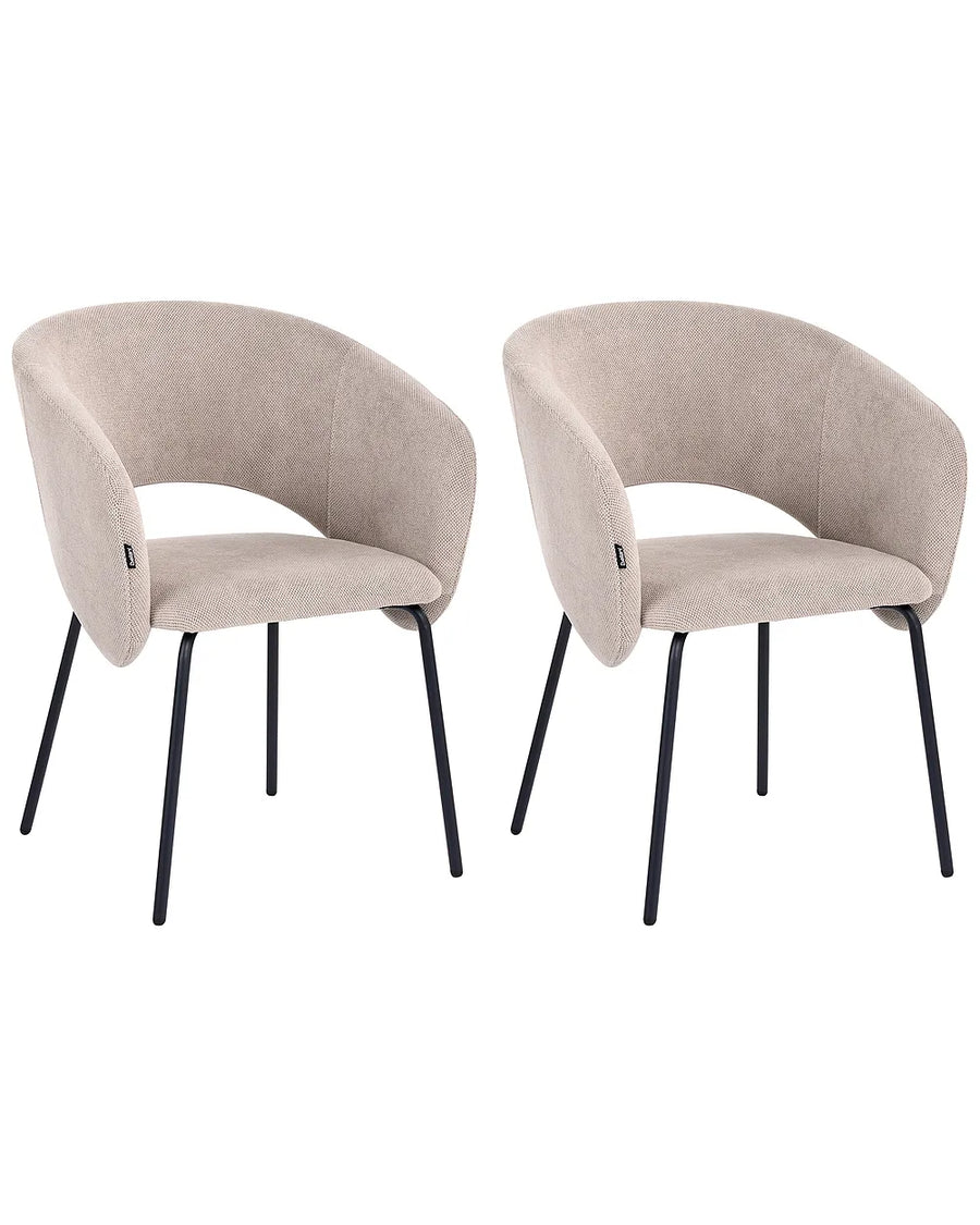 Two matching upholstered dining chairs with curved backs and slim black metal legs, shown side by side on a plain white background.
