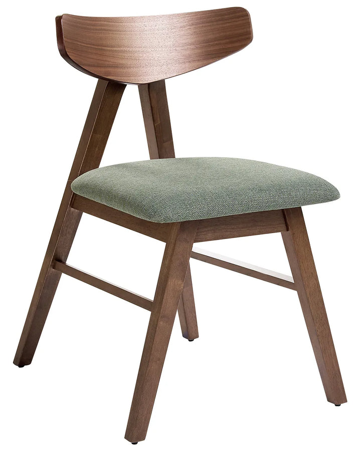 Wooden chair with a green cushion on a white background