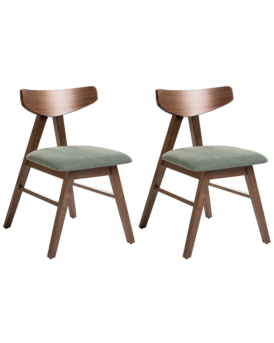 Two wooden chairs with green seats on a white background