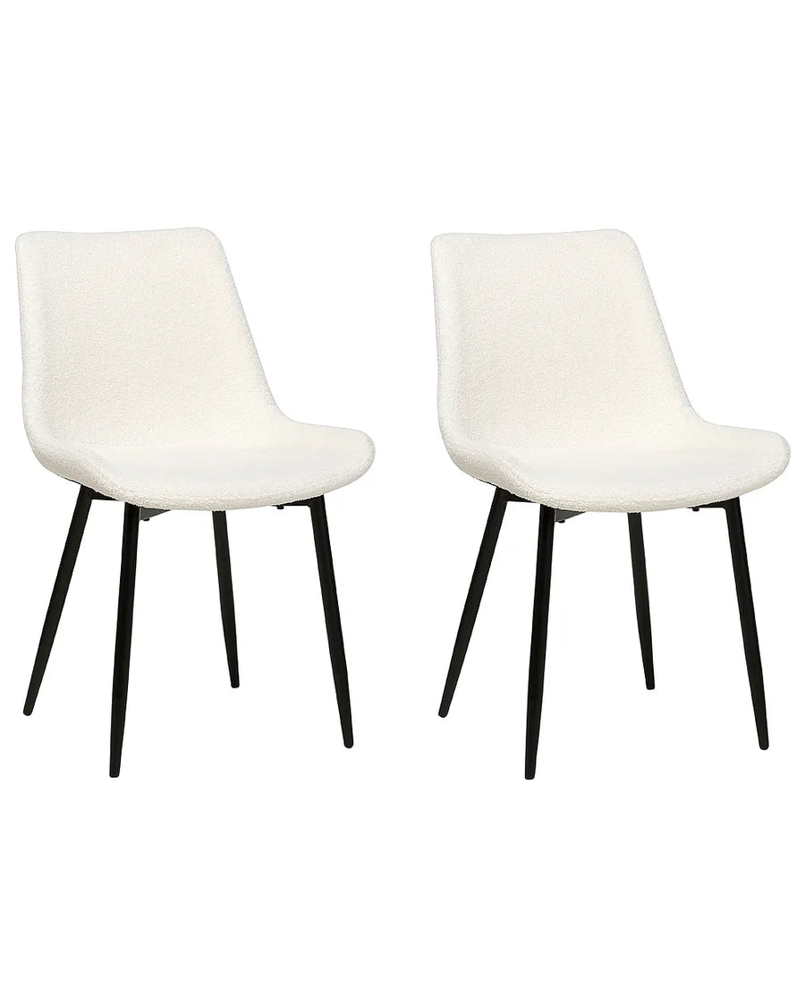 Two modern dining chairs with white textured upholstered seats and slim black metal legs, shown side by side on a plain white background.