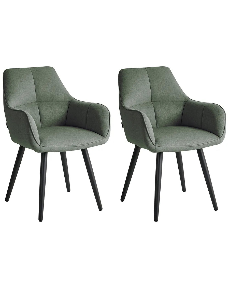 Two upholstered dining chairs in a muted sage green fabric with tapered black legs, shown side by side on a plain white background.