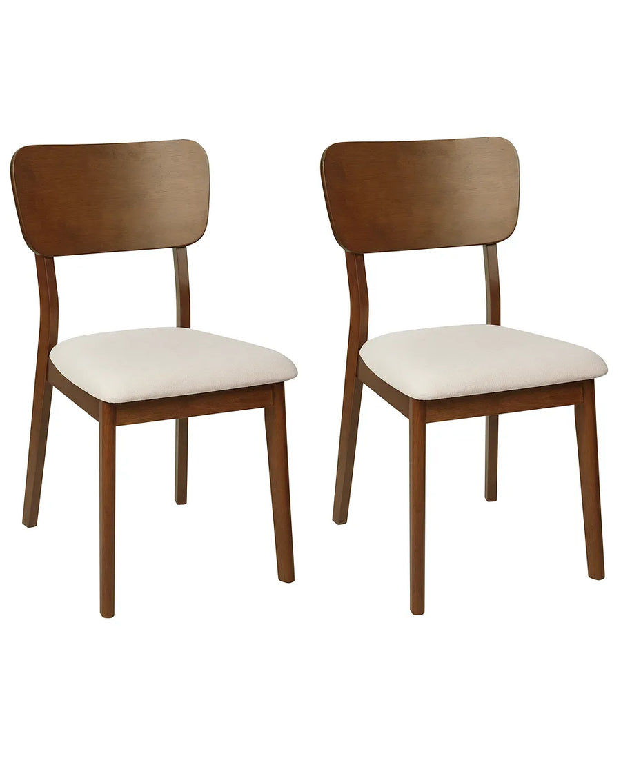 Two wooden dining chairs with light beige upholstered seats, shown side by side on a plain white background.