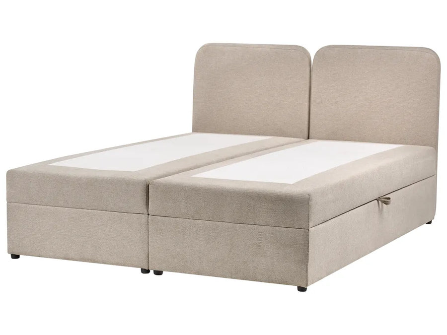 Beige fabric bed with storage drawers on a white background