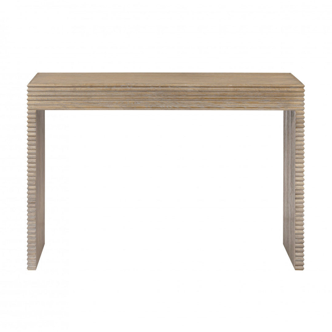 Wooden console table with a ribbed design on a white background