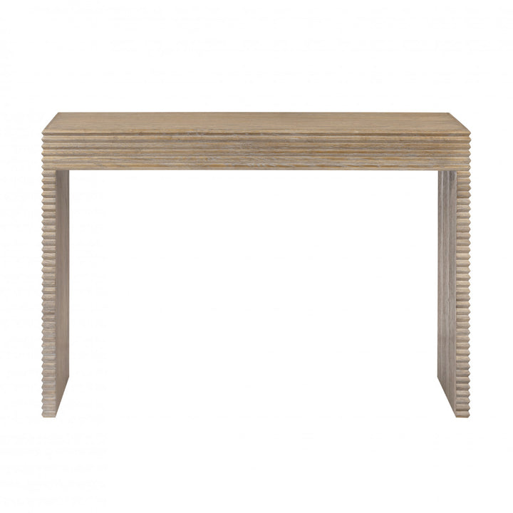 Wooden console table with a ribbed design on a white background