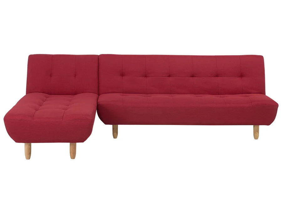 Red sectional sofa on a white background