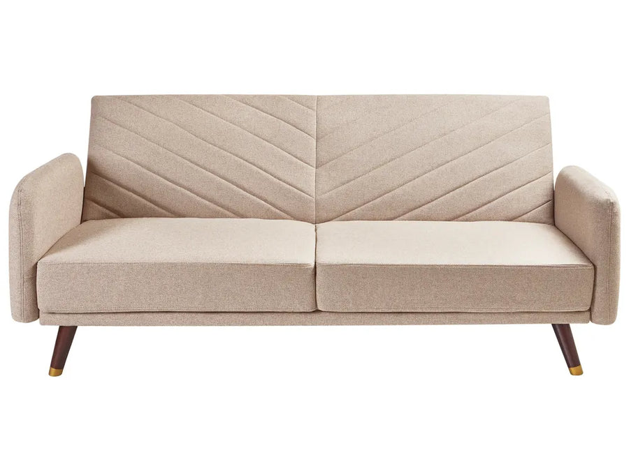 Beige sofa with a chevron pattern on a white background