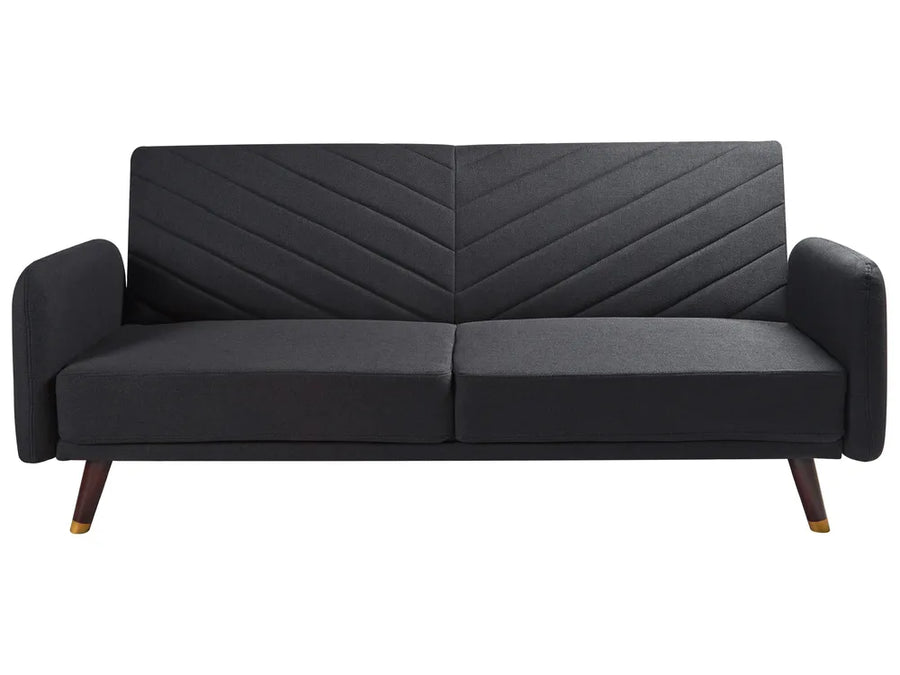 Black chevron-patterned sofa on a white background