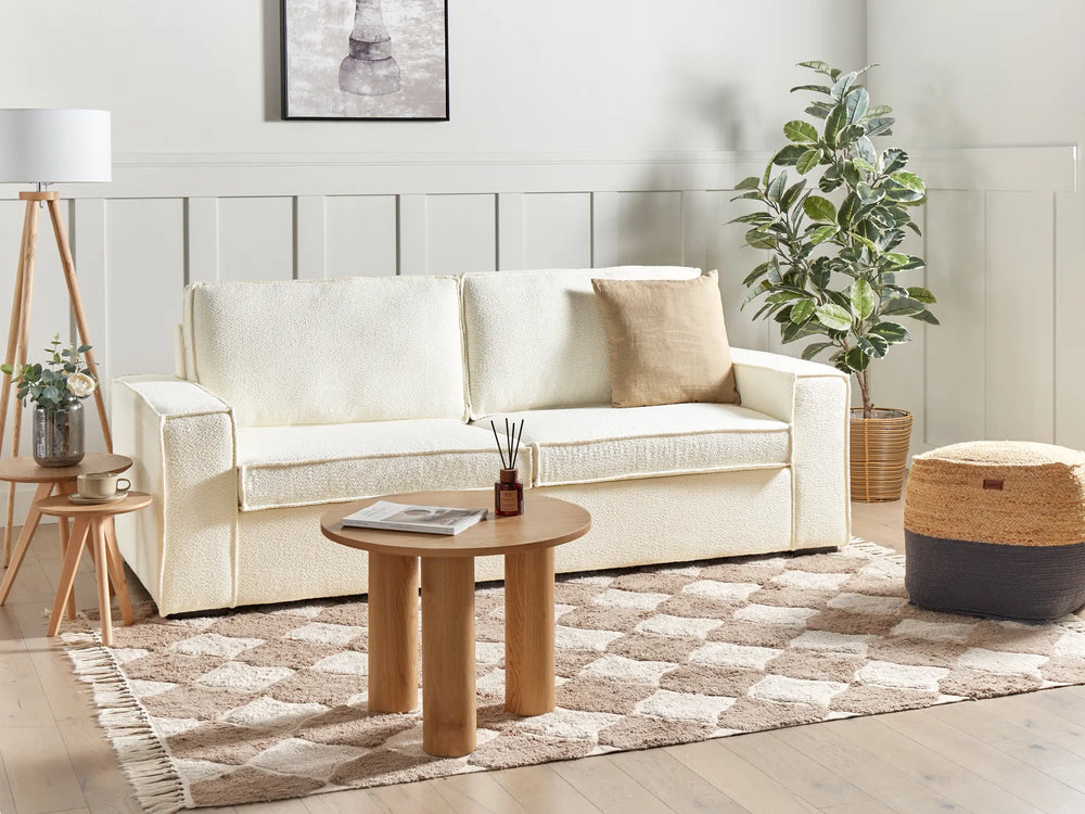 Bertina off-white bouclé three seater sofa converting into a double bed