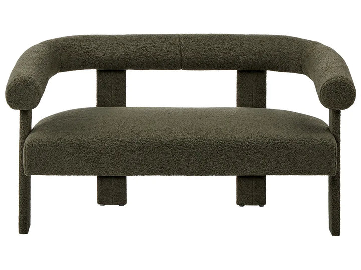 Green sofa with curved armrests on a white background