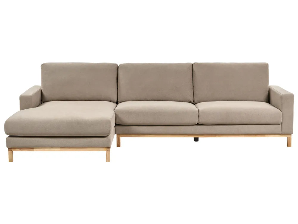 Beige sectional sofa on a white background