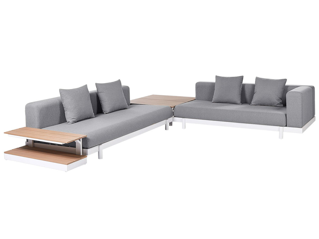 Gray sectional sofa with wooden tables on a white background