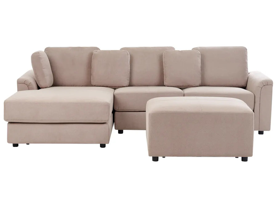 Beige sectional sofa with ottoman on a white background