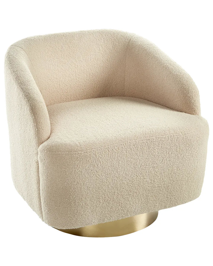 Beige upholstered chair with a gold base on a white background