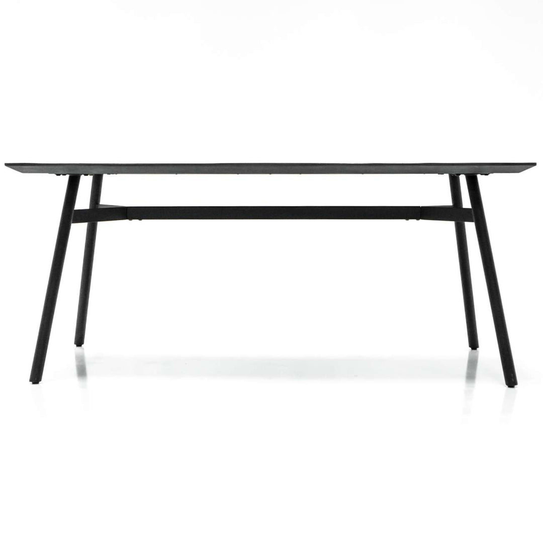 Black metal dining table on a white background