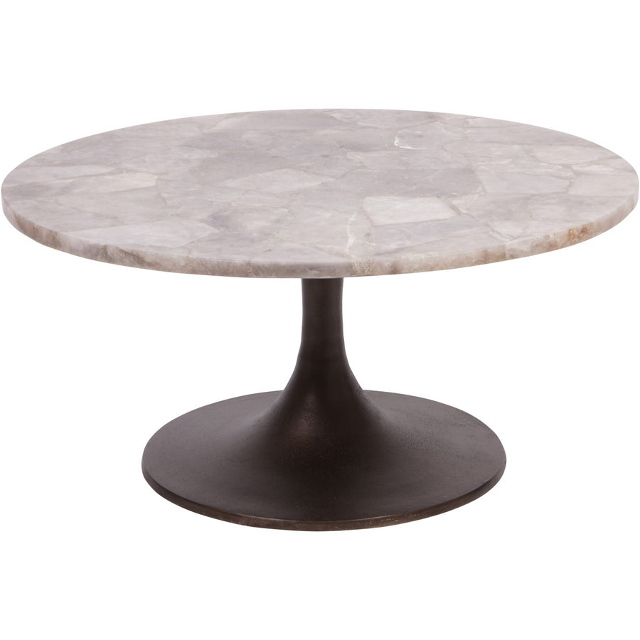 Round marble table with a dark metal base on a white background