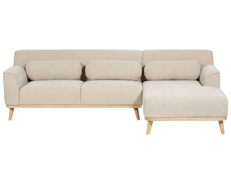 Beige sectional sofa on a white background