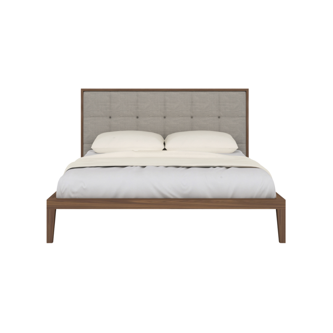 Bed with wooden frame and upholstered headboard on a white background