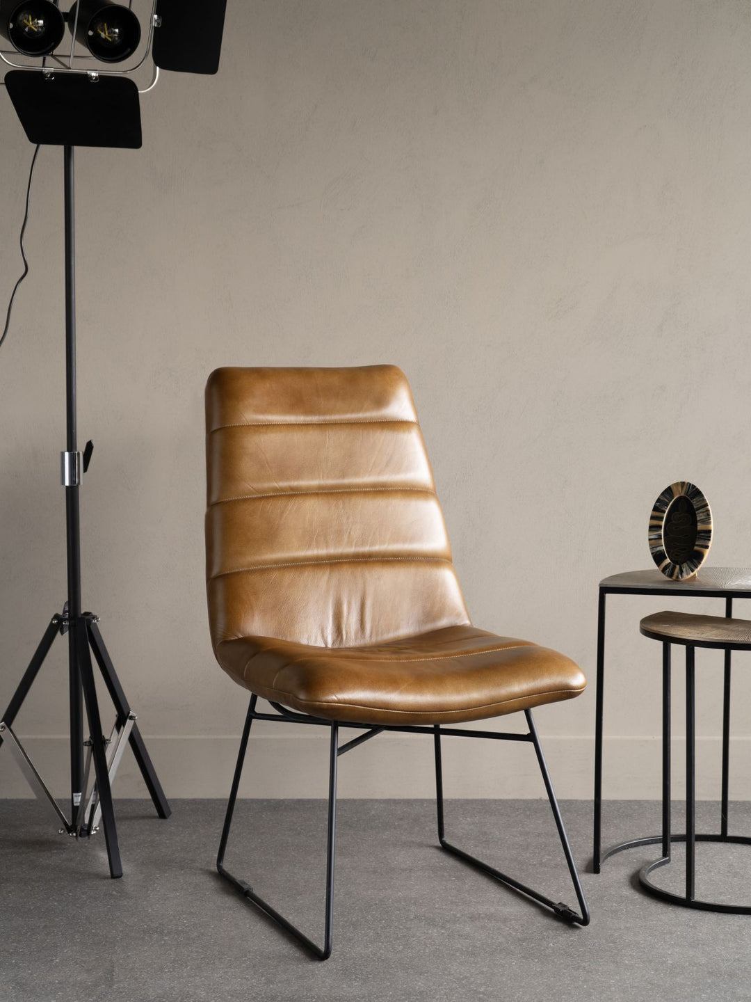 Cognac leather dining chair with premium upholstery