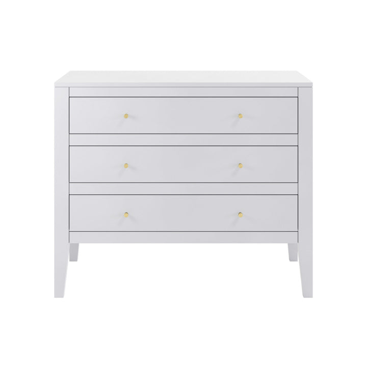 White dresser with gold knobs on a white background