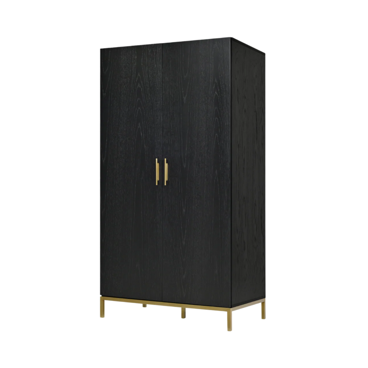 Black cabinet with gold legs and handle on a white background