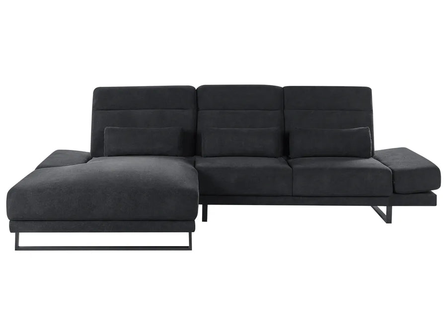 Black fabric right-hand corner sofa with adjustable backrests and headrest in a modern living room
