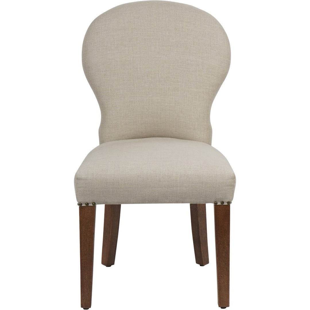 Beige upholstered chair with wooden legs on a white background