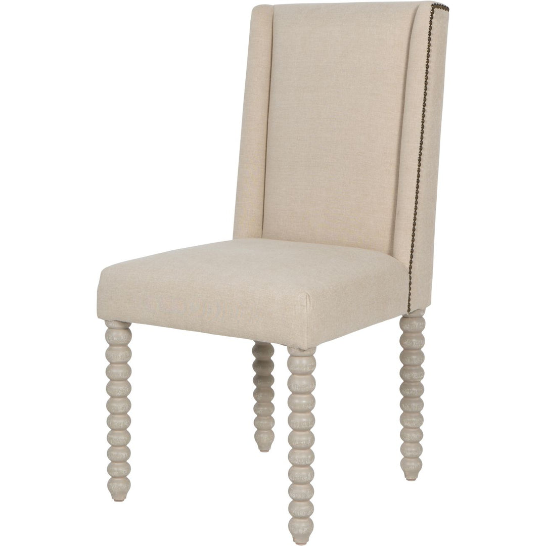 Beige upholstered chair with spiral legs on a white background