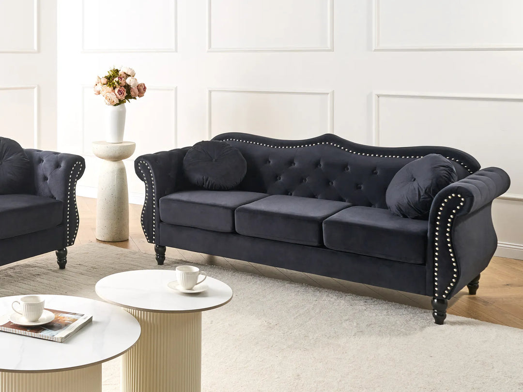 Black velvet 3 seater sofa with tufted backrest
