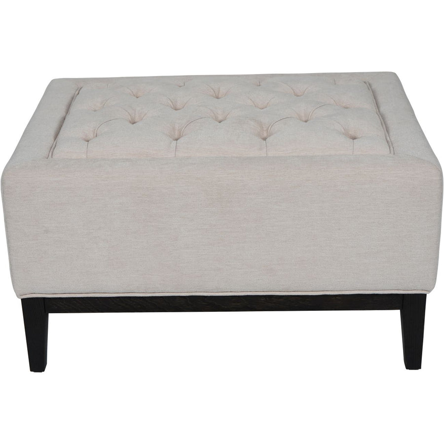 Deep buttoning and tactile woven ivory fabric on Libra Theodore footstool