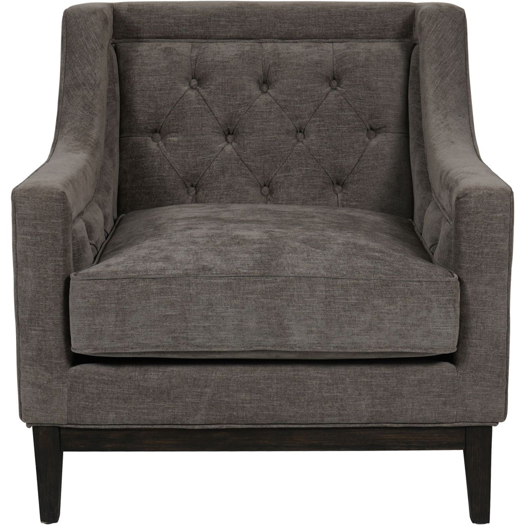 Gray upholstered armchair with tufted backrest on a white background