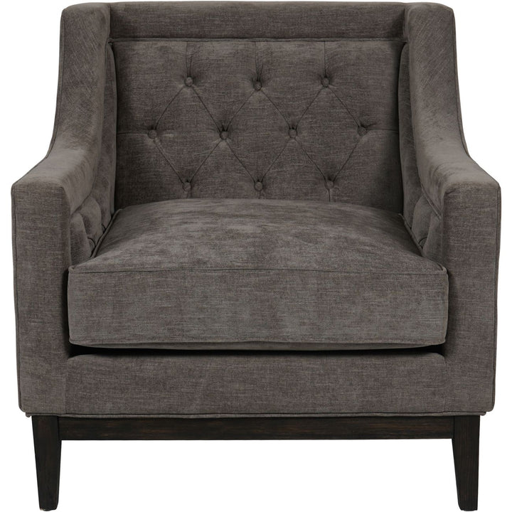 Gray upholstered armchair with tufted backrest on a white background