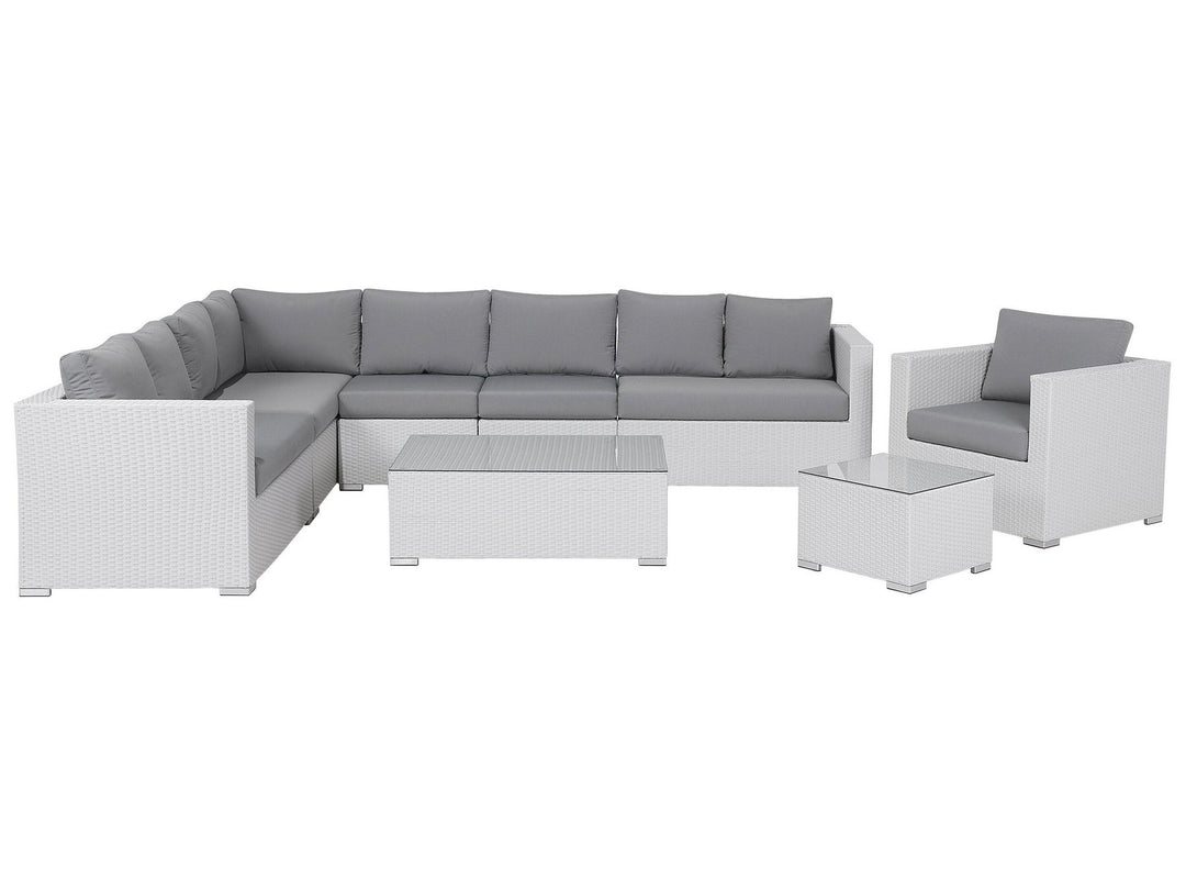 Outdoor furniture set with a sectional sofa and chairs on a white background