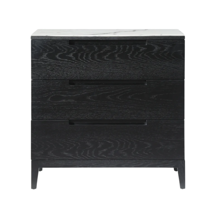 Black wooden dresser with marble top on a white background