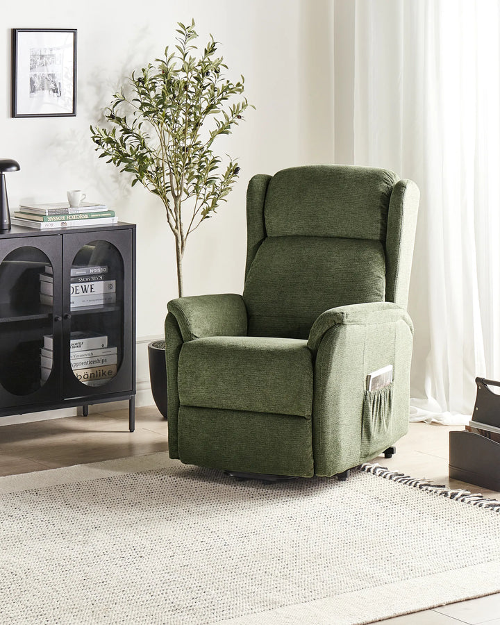 Upholstered in soft green fabric.