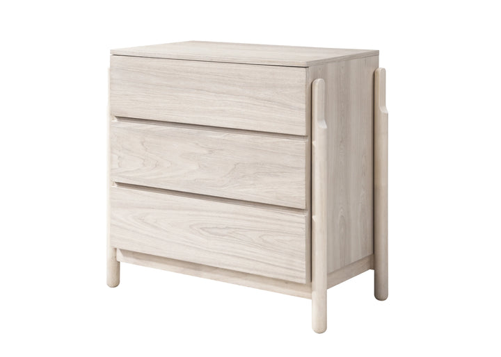 Light wood dresser with three drawers on a white background