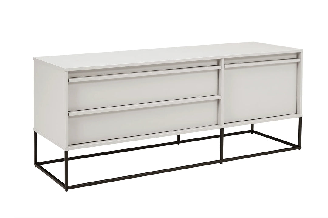 White dresser with black metal legs on a white background