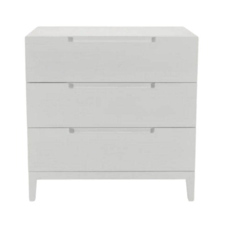 White dresser with three drawers on a white background